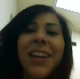 A Hispanic girl records herself taking a shit for her friend and records others from under the stall wall in the bathroom. She tries to show us her poop underneath all of the toilet paper when finished.
